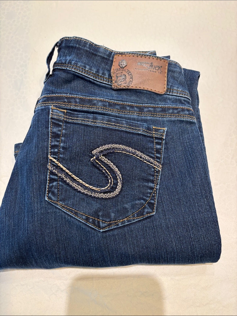 Silver Jeans Women's Blue Bootcut Denim with Embroidered Back Pocket
